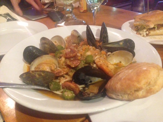 Seafood Gumbo: Linguini with shrimps, clams, calamari, mussels, Chorizo, roasted tomato, red wine and basil saffron